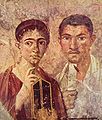 Portret Paquiusa Proculusa (trzymającego zwój) z małżonką (trzymającą tabliczki woskowe). Fresk z Pompejów, Narodowe Muzeum Archeologiczne w Neapolu.