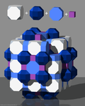 Стільник з ромбокубооктаедрів, зрізаних кубів, восьмикутних призм та кубів