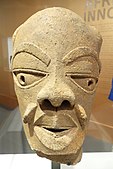 Male head; 550–50 BC; terracotta; Brooklyn Museum (New York City, USA). The mouth of this head is slightly open. It maybe suggests speech, that the figure has something to tell us. This is a figure that seems to be in the midst of a conversation. The eyes and the eyebrows suggest an inner calm or an inner serenity.