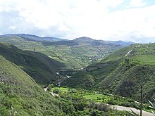 A picture of a lush river valley