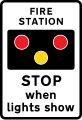 Fire station ahead, STOP when lights show. "FIRE" may be varied to "AMBULANCE"