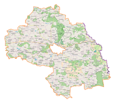 Mapa konturowa powiatu chełmskiego, blisko centrum na prawo u góry znajduje się punkt z opisem „Żalin”