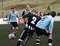 Image 14TB Tvøroyri is the oldest football club of the Faroe Islands, it was founded in 1892. Óli Johannesen (in black/white) holds the record for most capped player of the Faroe Islands national football team. Here TB plays against Víkingur Gøta. (from Culture of the Faroe Islands)