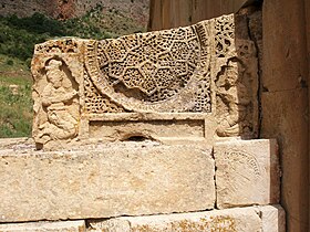 Broken khachkar to the left of Astvatsatsin church