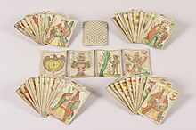 Jeu de cartes d'aluette ou de 'Vache' de l'atelier Veuve Roiné aîné de Nantes composé de 48 cartes