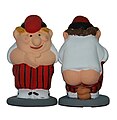 Caganer («driter»), en tradisjonell figur i julekrybber i Catalonia i Spania, iført rød barretina («liten lue»), en type topplue som var vanlig i gamle dager, særlig blant bønder.