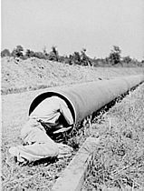 Cleaning the inside of the pipe by hand,