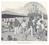 Photo of many people at a market