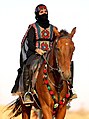 Image 24A Saudi woman riding a horse at Souk Okaz, a yearly cultural festival in the outskirts of Taif (from Culture of Saudi Arabia)