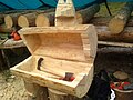 Log furniture: chest from a hollowed log open