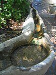 The water channels running on top of the balustrades of the Water Stairway