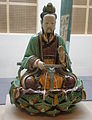 Estatua de Buda sentado, cerámica vidriada verde y amarilla, período Ming