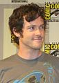 Brendan Hines interpreta Logan Sanders