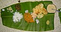 Almoço indiano servido em folha de bananeira