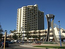 A high rise hotel building photographed from the ground