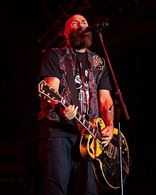 Armstrong performing in 2023