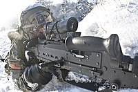 M145光学照準器を装着したM240機関銃