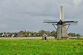 Zicht op Kimswerd en de molen De Eendracht