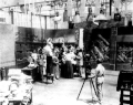 Image 43A.E. Smith filming The Bargain Fiend in the Vitagraph Studios in 1907. Arc floodlights hang overhead. (from History of film)