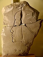 Limestone trial piece of a private person. Head of a princess on the reverse. Reign of Akhenaten, Amarna. Petrie Museum