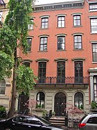 123-125 East 10th St. (1854) is an Anglo-Italianate townhouse, the other style prevalent in the district