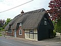 69 High Street, a thatched 15th century cruck cottage