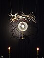 Monstrance as part of a postmodern Easter "Tomb of the Lord" scene in a church in Warsaw, Poland