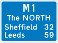 Route number of the motorway with destinations and distances to places along or reached from that route