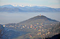 Blick auf Preserje mit Josephkirche, Triglav am Horizont