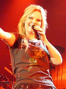 Olzon performing with Nightwish in 2009