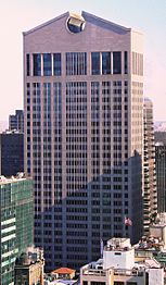 550 Madison Avenue, New York, with a top broken pediment, reminiscent of those found in Baroque highboys, by Philip Johnson, 1981-1984[180]