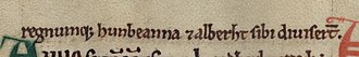 Gros plan sur un manuscrit : une ligne de texte à l'encre noire