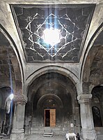 Astvatsankal Monastery: the gavit and its vault with muqarnas design, with a central erdik or oculus, which may have been covered by a colonnaded canopy. 1250.[22]