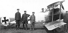 Fokker Biplane D.V G81 17, pilot, and flight crew (1916).jpg