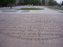 Oval containing the title of the L'Enfant Plan followed by the words "By Peter Charles L'Enfant" inlaid in Freedom Plaza in 2006