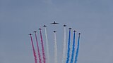 The Red Arrows fly over the Mall.