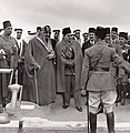 Image 14Abdulaziz (left) and Farouk checking an Egyptian Army unit in 1946. Other people picture include princes Fahd, Abdullah, and Mishaal, as well as prince Muhammad Abdel Moneim. (from History of Saudi Arabia)