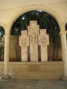 A modern Amenaprkich-type khatchkar with two others at the Sourp Nshan Church in downtown Beirut, Lebanon (2001)