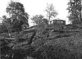 View of the ruins and the Lumbini pillar from the South