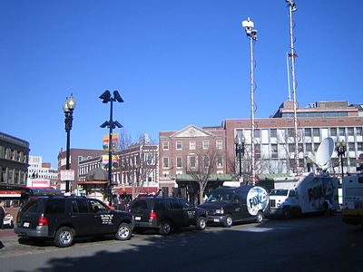 WFXT's trucks in Boston's Harvard Square