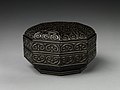 Octagonal food box with pommel scrolls, Ming dynasty