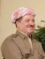 Massoud Barzani, president i den den kurdistanske regionen i Nord-Irak, bærer et palestinaskjerf som er surret rundt hodet.