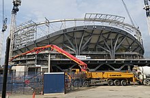 Compression ring with cable net roof structure installed, April 2018