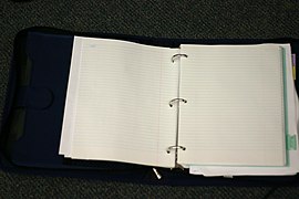 Three-ring binder, open