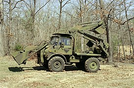 UNIMOG with front loader and excavator attachment (backhoe loader)