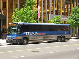 A CT Transit express bus in Hartford serving Route 928 in 2018. The bus uses CT Transit's current blue and silver color scheme.