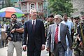 U.S. Ambassador Hans G. Klemm, Coordinating Director of Rule of Law and Law Enforcement, and Kunar Governor Fazlullah Wahidi walking through Asadabad in May 2011