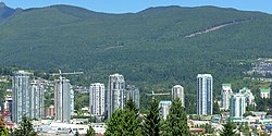 Skyscrapers in the Town Centre area of the city of Coquitlam, with the North Shore Mountains in the background.