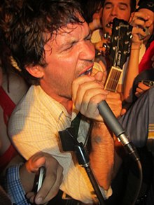 Tim Kasher performing in the crowd with Cursive at the Concert for Equality