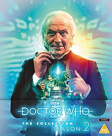 Cover art of William Hartnell in front of a blue background. Smaller images in front of Hartnell include several characters, such as the Daleks and Zarbi.